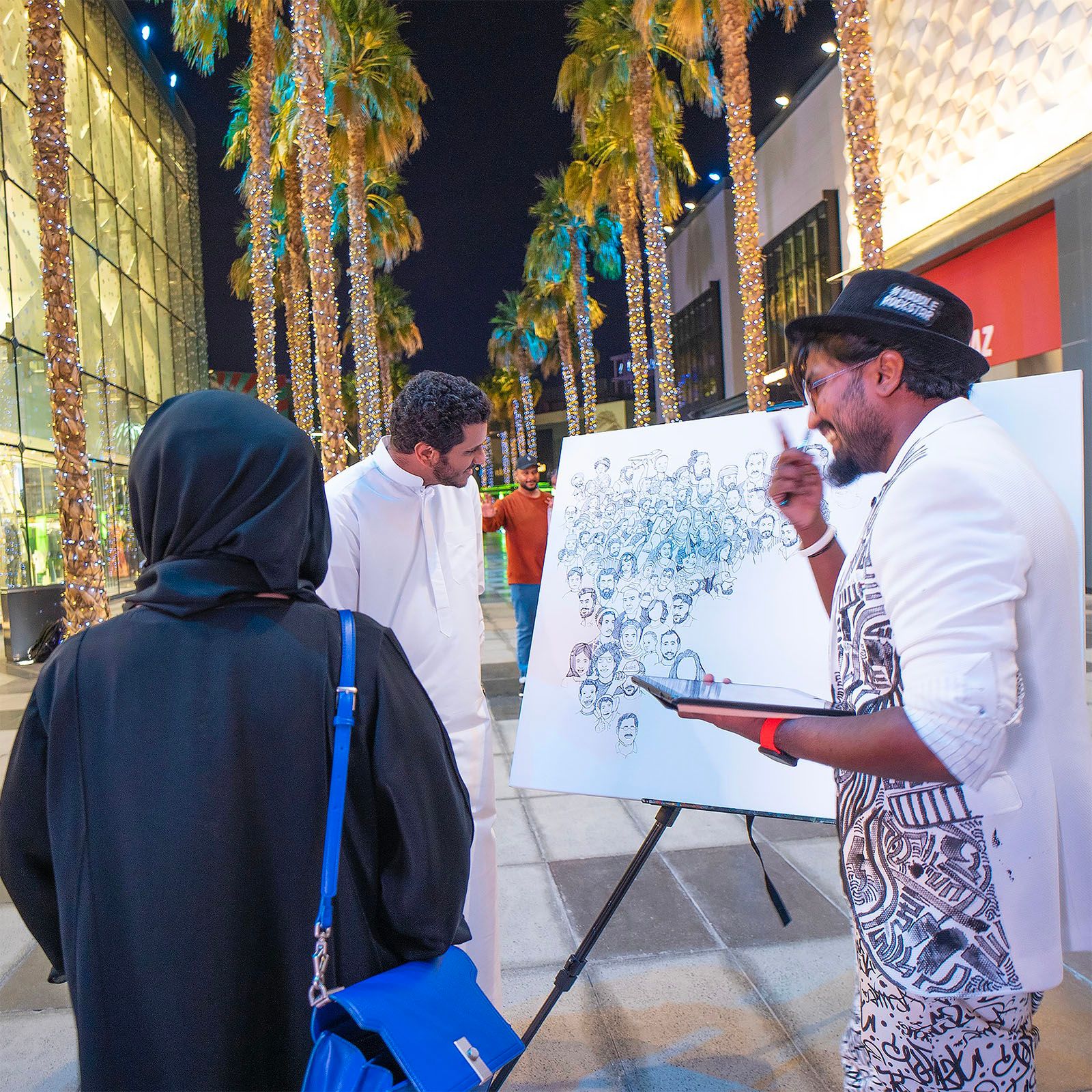 300+ faces to be painted on a single canvas by one person in Dubai, United Arab Emirates